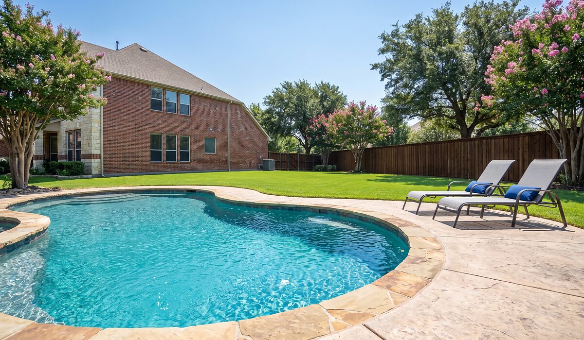 Sparkling backyard swimming pool at a Texas home on a sunny day